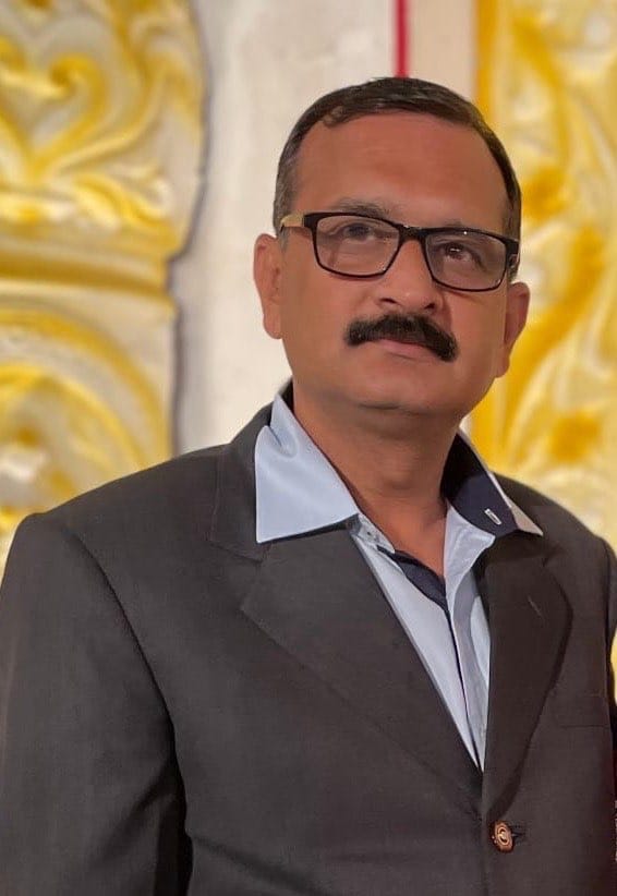 Dr. Mahesh Sharma